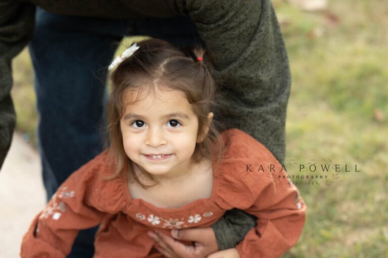 Three year old during a maternity session in downtown Houston with Kara Powell Photography.