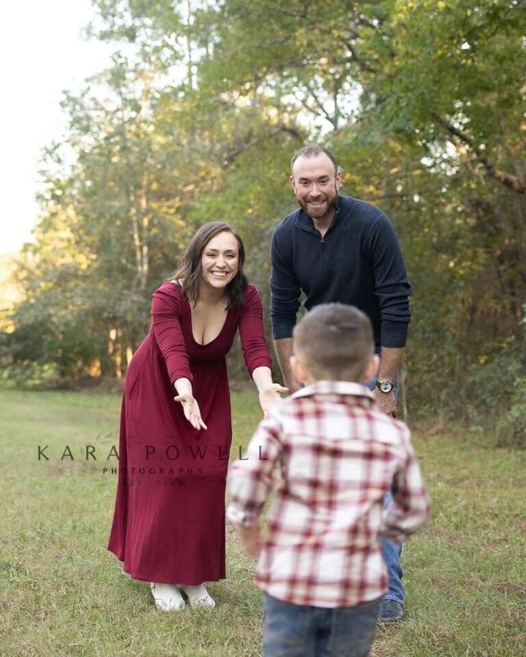 Family of three is Woodlands TX park during Kara Powell Photography session.