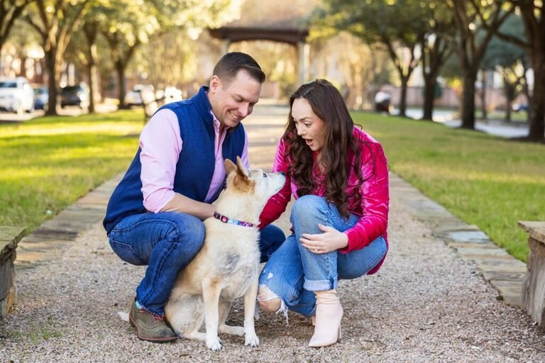 Woodlands TX couple with their dog in the park by their home. Taken by Kara Powell Photography.