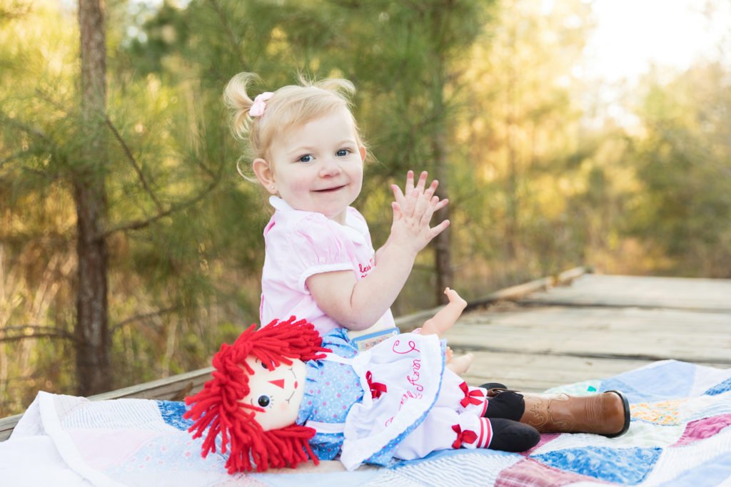 Two year old heart warrior in park in Conroe TX