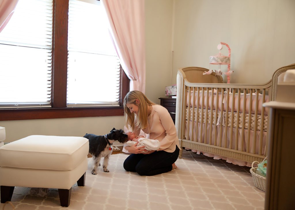 Woodlands Lifestyle Photos - New mom, baby and dog bond in the nursery