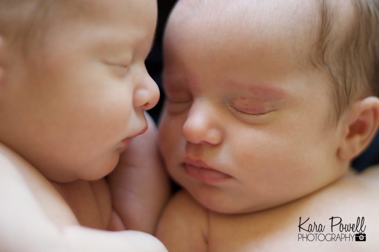 Woodlands Newborn Photographer - close up of newborn twins faces