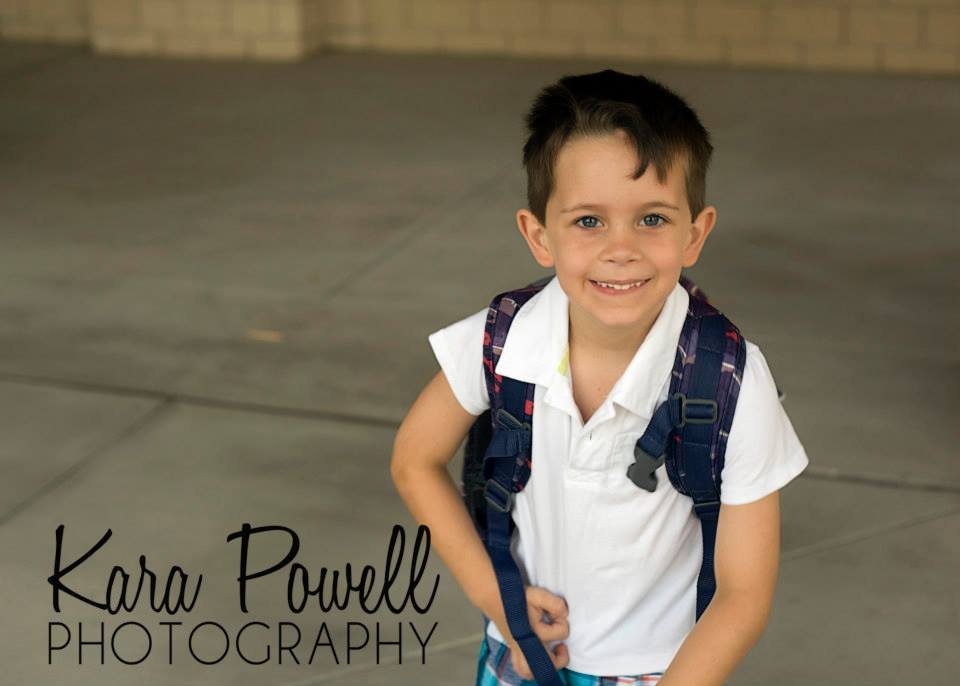 first day of school photos - kindergartner outside of school