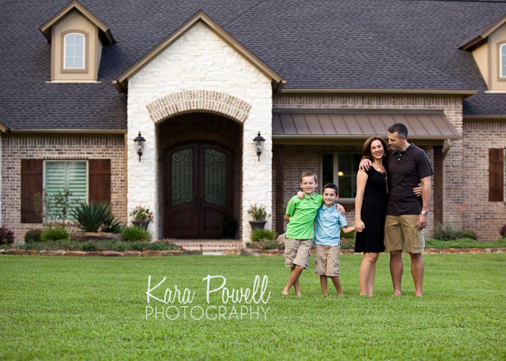 Montgomery TX family of four outside of their home during their lifestyle session