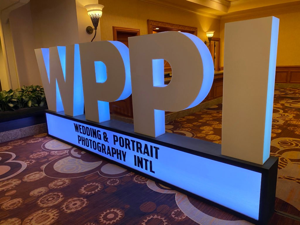 Photo of a lit up sign that says WPPI.