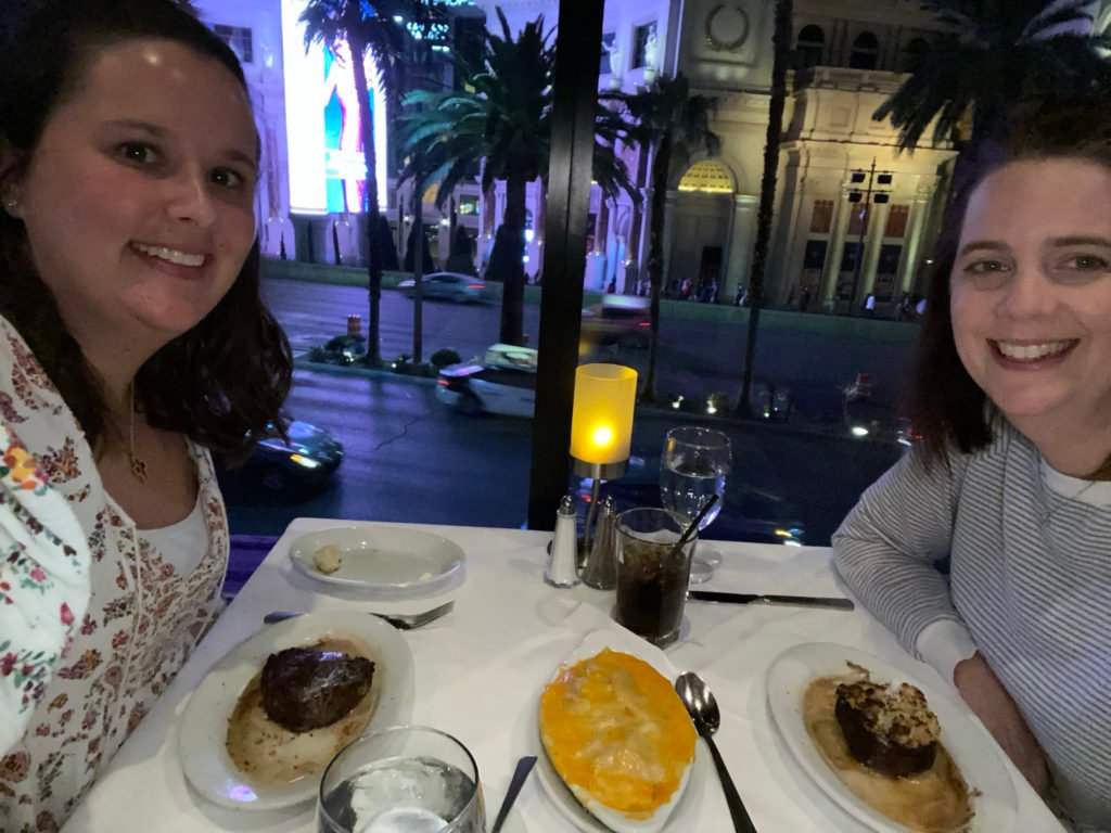 Kara and Jenna enjoying their steak dinner during their WPPI trip.