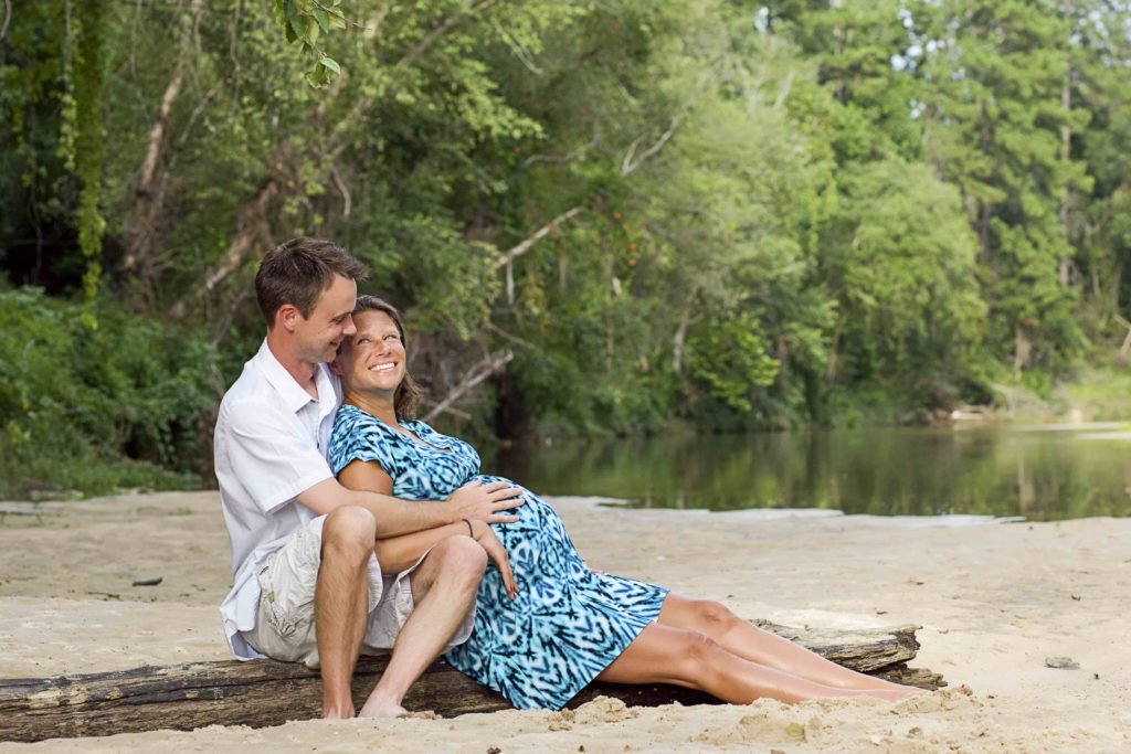Huntsville TX expecting mother and husband in a creek