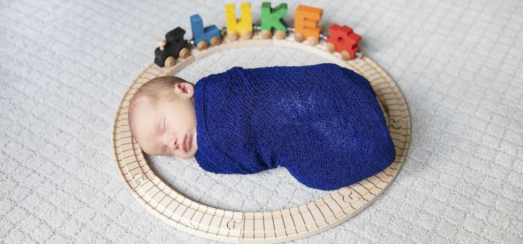 Richmond TX baby boy newborn during his in-home newborn session The Woodlands Newborn Photographer