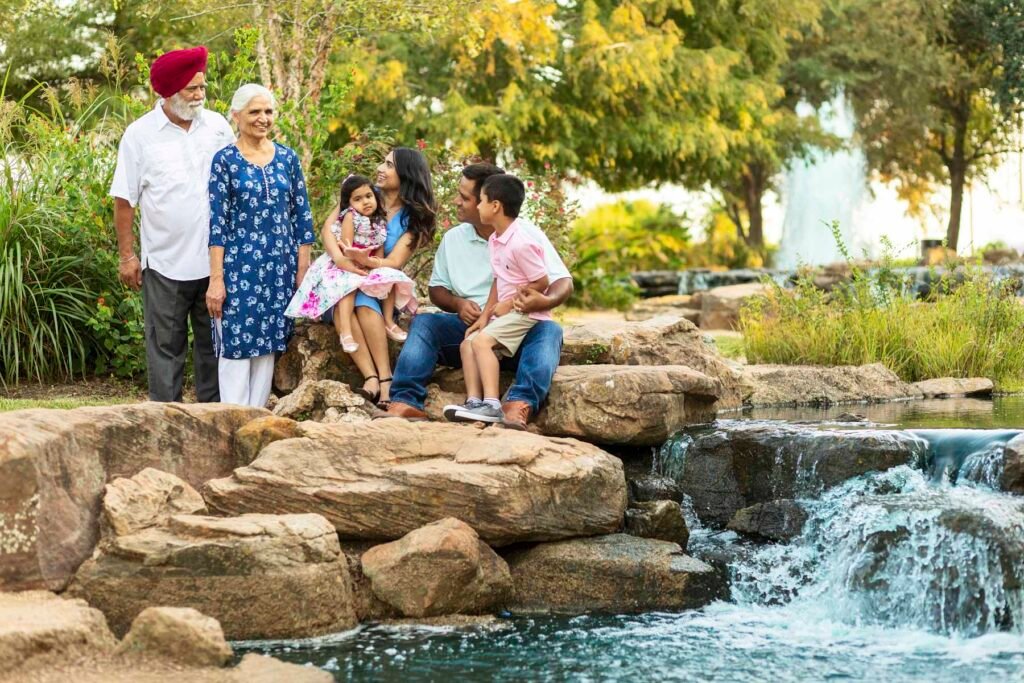 Extended family of 6 at sunset at their family session in Sugarland