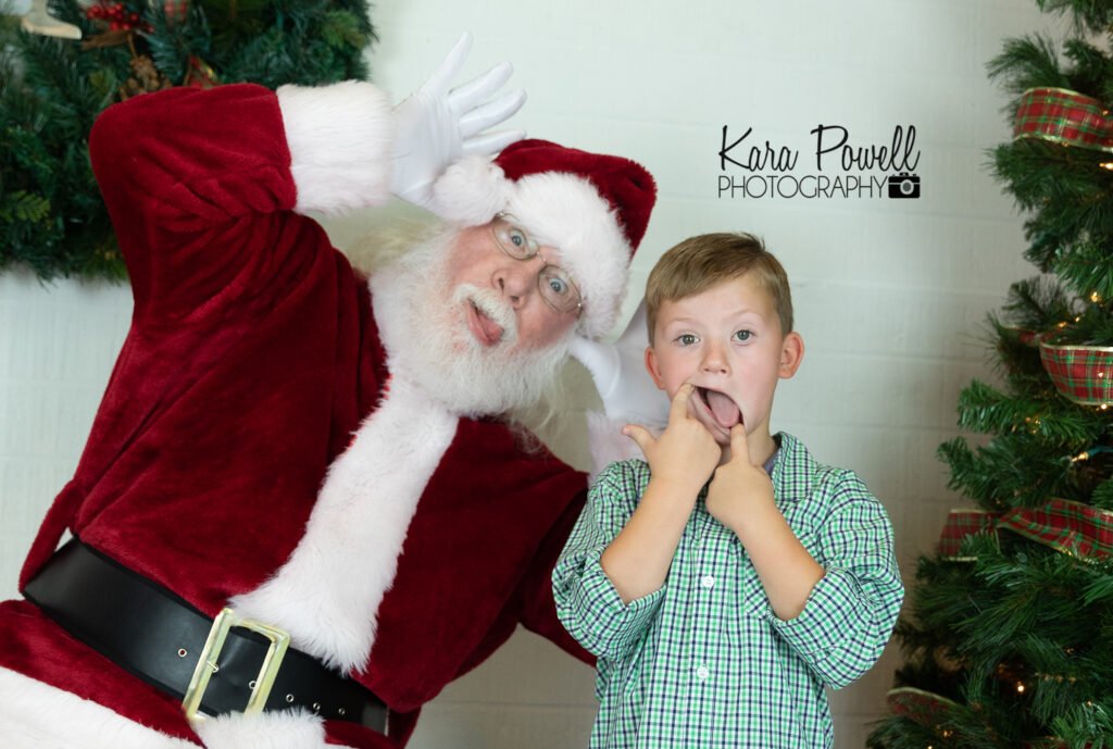 A little boy meets Mr Claus