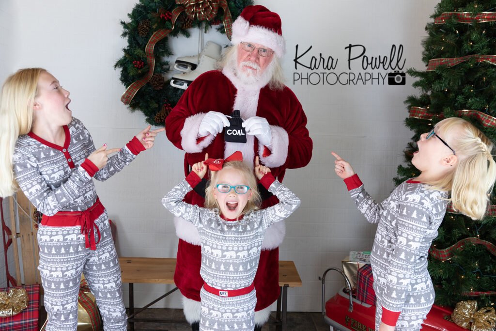 Three sisters are shocked and surprised to receive coal from Santa Claus.