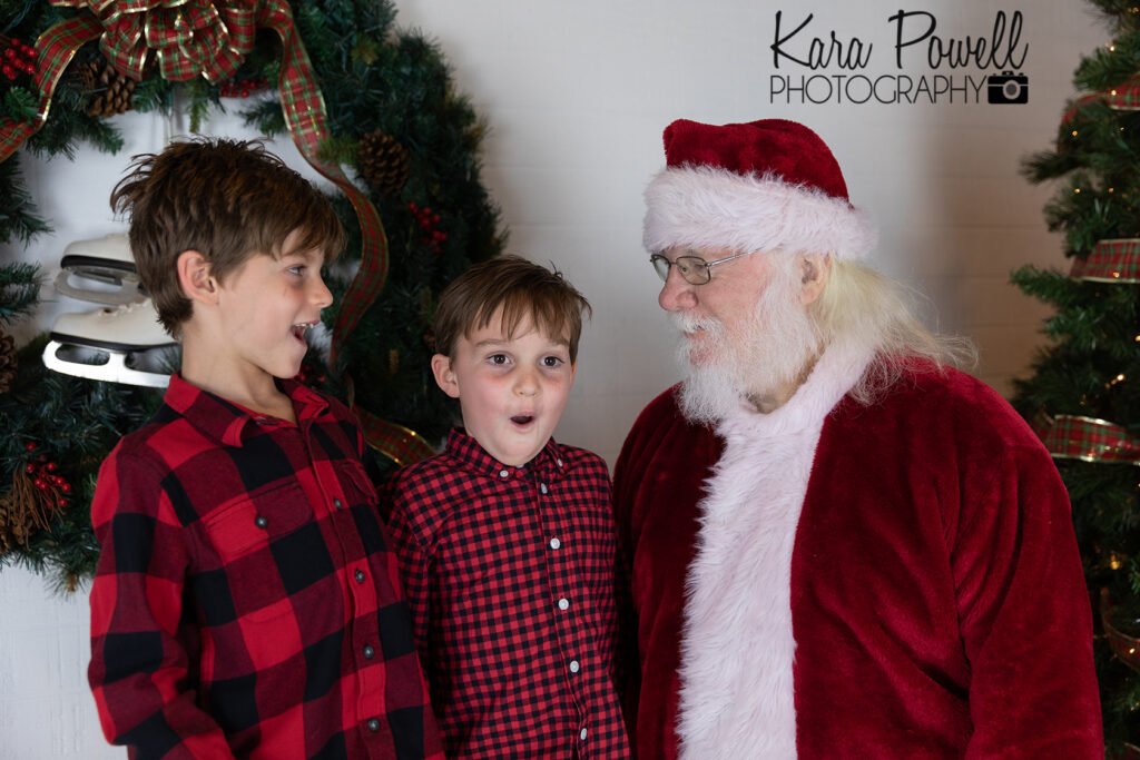 Two little boys are shocked to hear what Santa Claus has to tell them at their Quiet Time With Santa Session.
