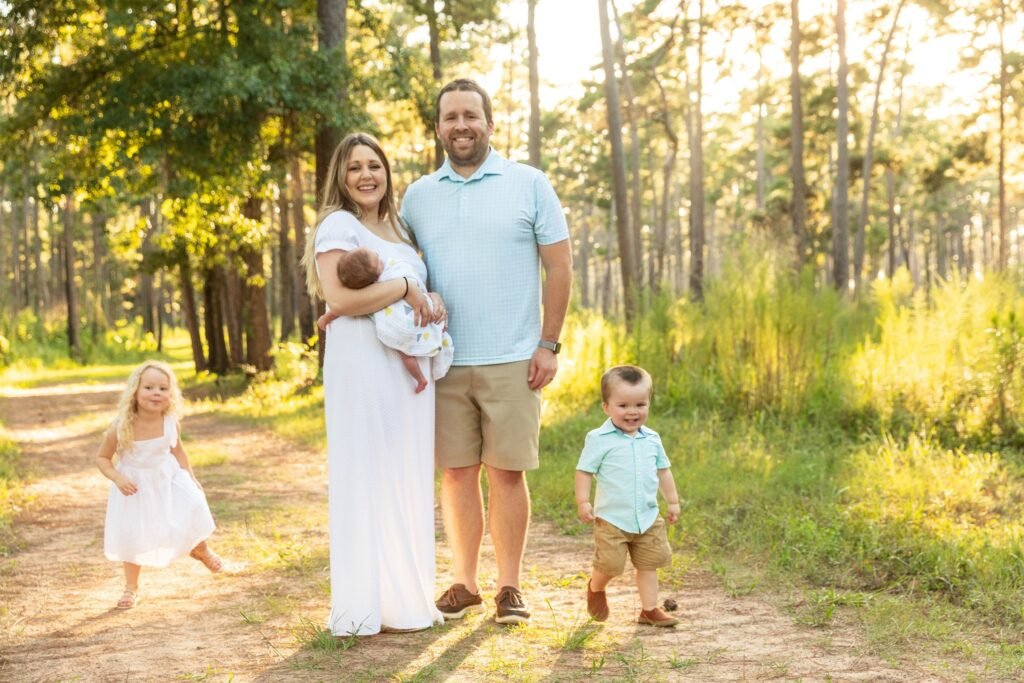 New family of five in the TX State forest. Taken by Kara Powell Photography.