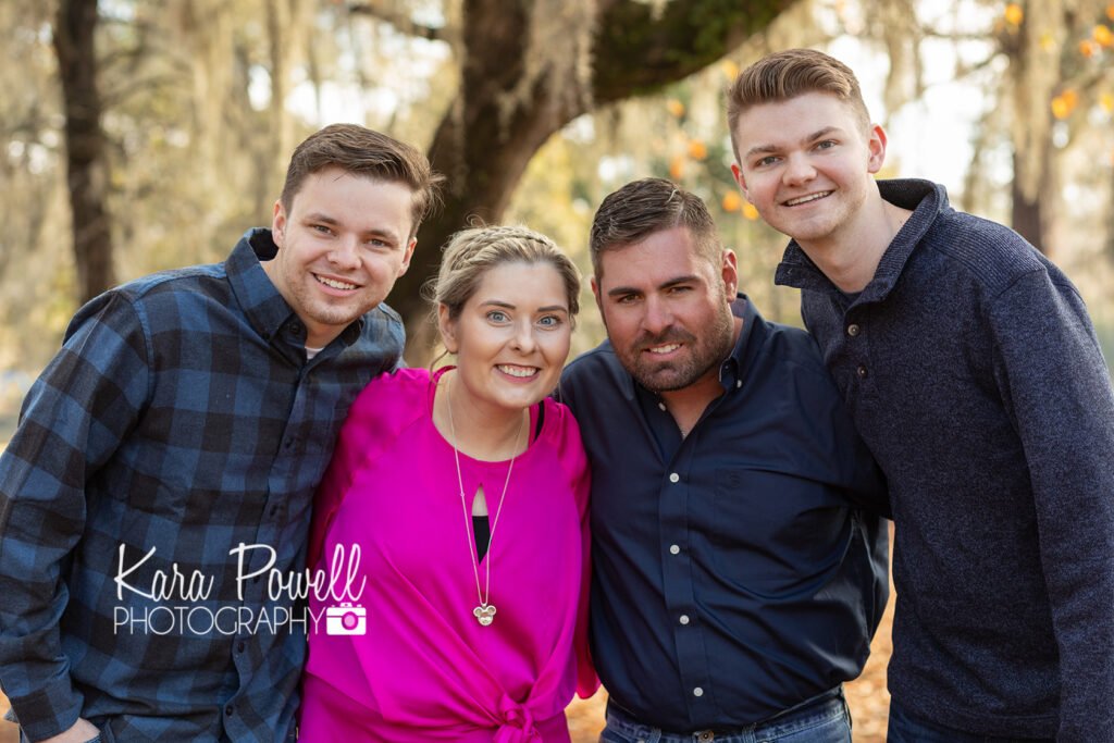 Four siblings pose together at Burroughs park in Tomball, Tx creating beautiful portraits last forever