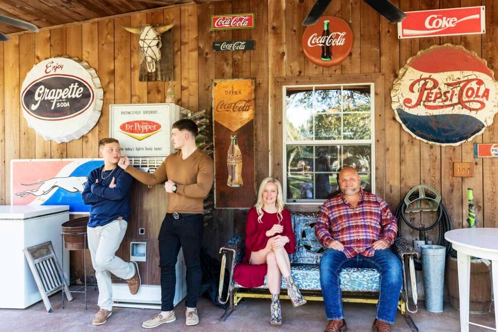 Family of four poses together at Townhall TX