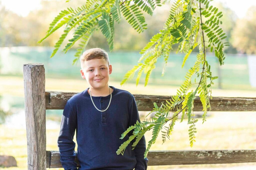 A middle school boy poses at Townhall TX