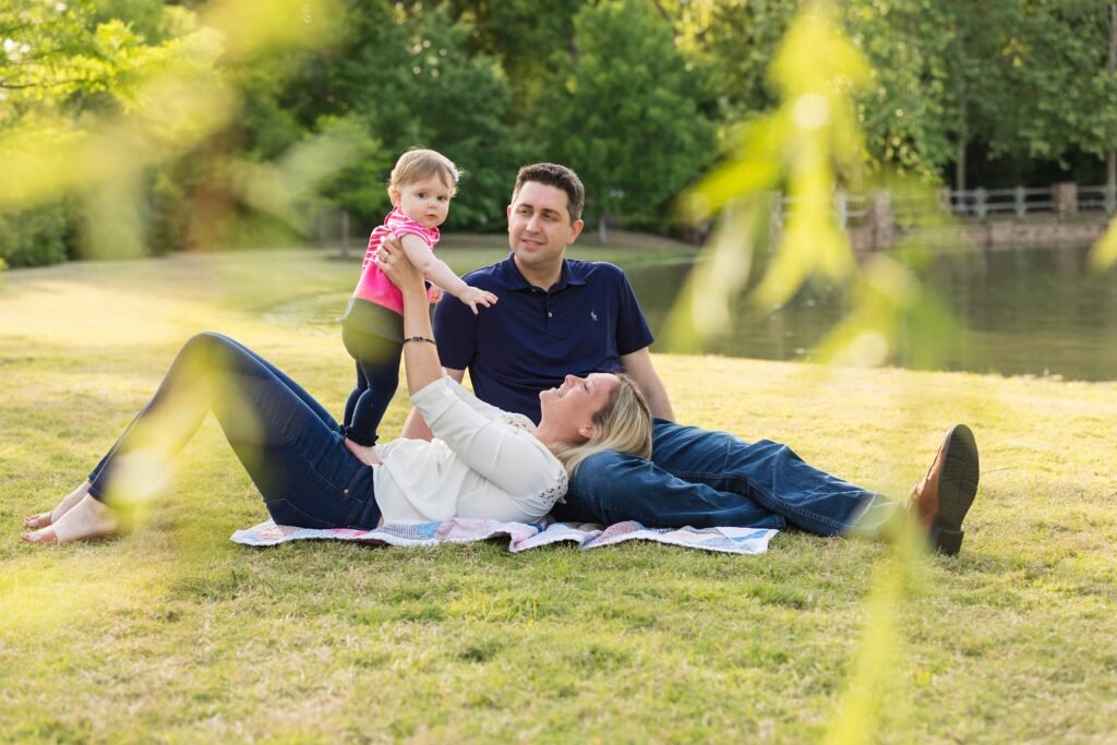 Parents with seven month old little girl in Tomball TX park