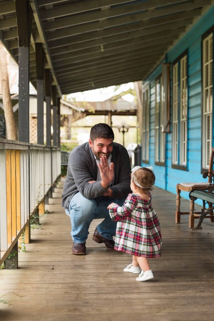 Father with daughter in downtown Tomball TX