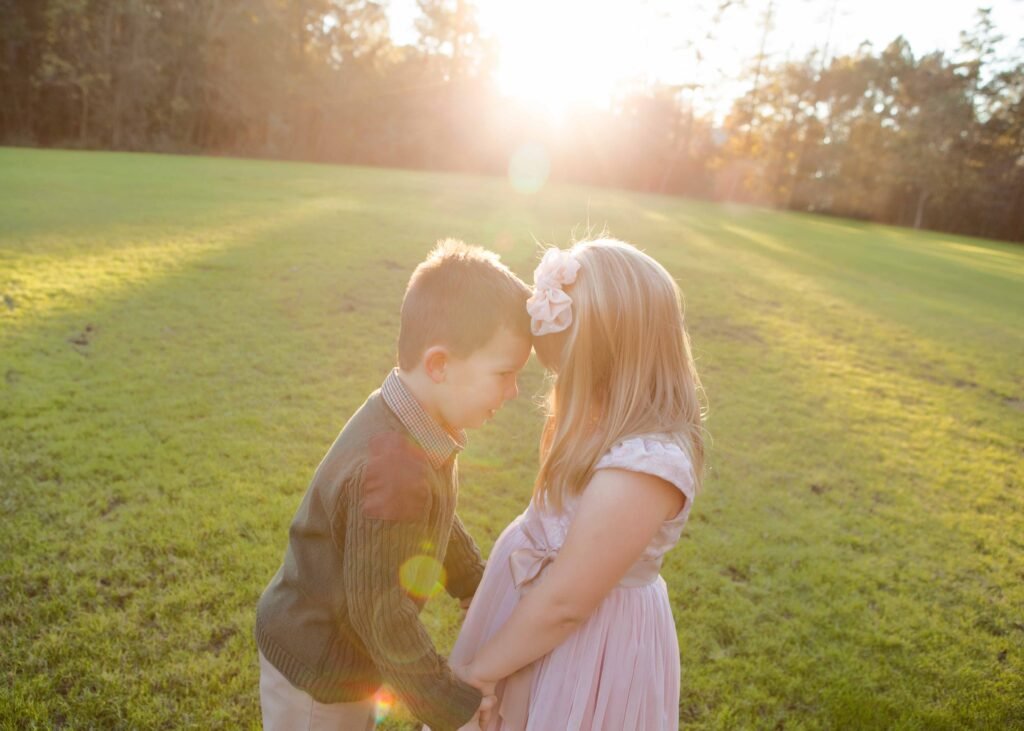 Cousins in the sunset in a park in the Woodlands TX