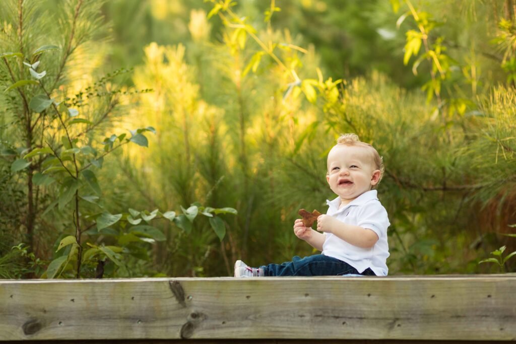 One year old on a bridge in Conroe TX
