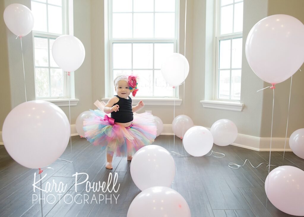 In-home one year session with ballons birthday session in Tomball TX