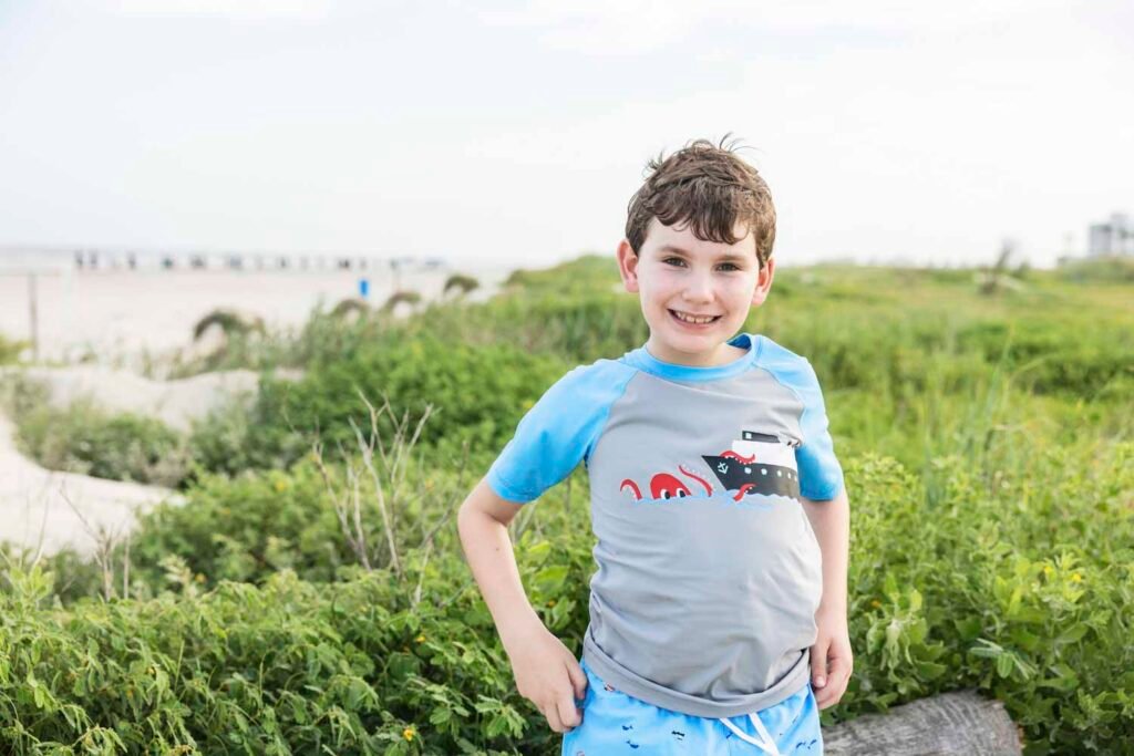 Boy exploring Galveston beach