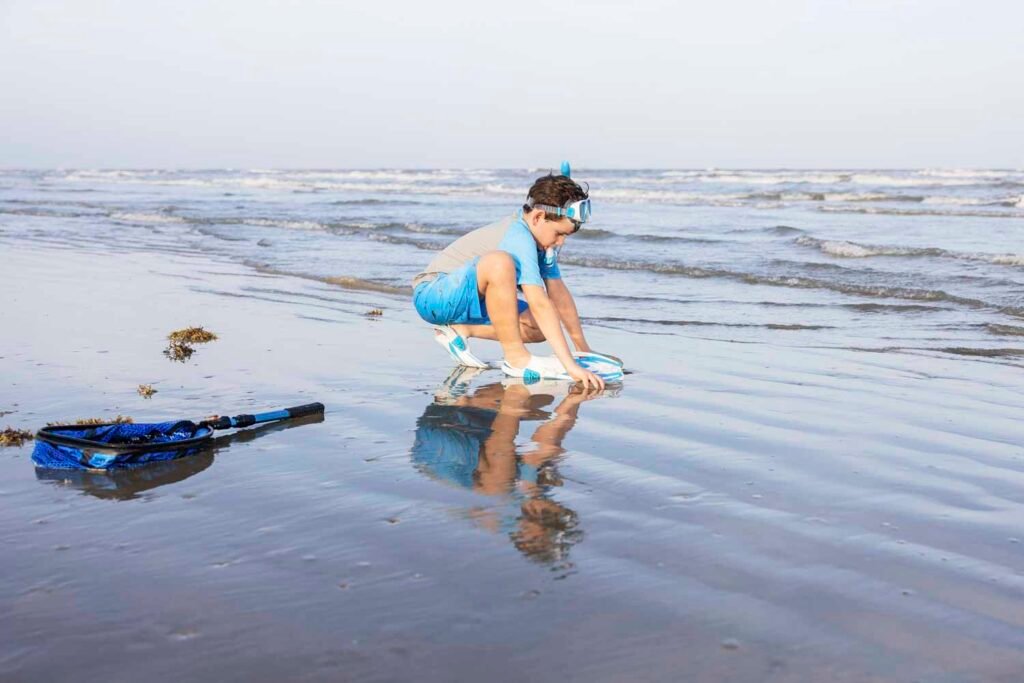 Eight year old enjoying Galveston beach