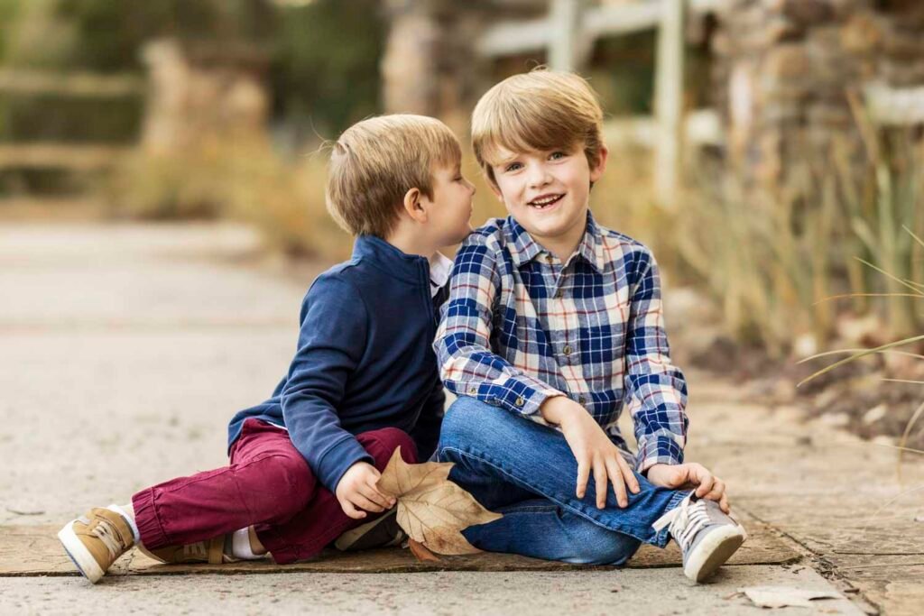 Brothers during fall in Tomball TX