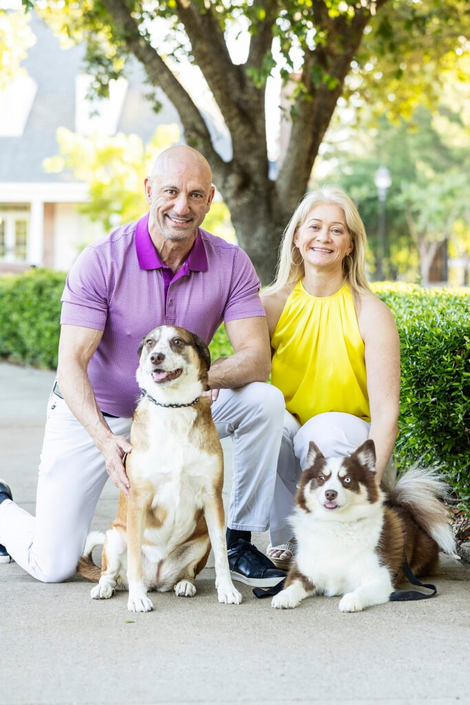 Woodlands TX couple with two dogs in East Shore