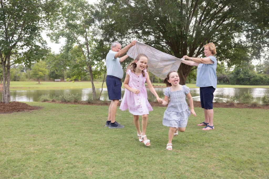 Extended family session in Tomball TX. Example of a lifestyle/casual session of Kara Powell Photography.