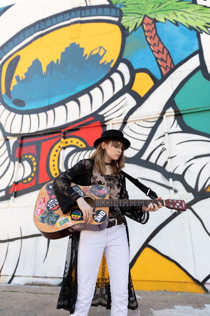 Houston TX senior with her guitar. Taken by Kara Powell Photography.